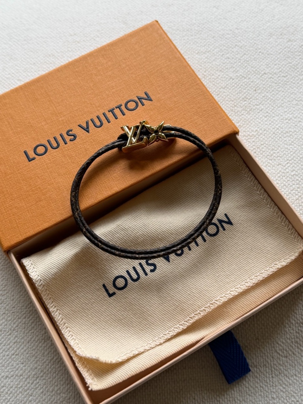 Louis Vuitton Dark Brown Braided Cord Bracelet with Gold LV Charm - Picture 1 of 3